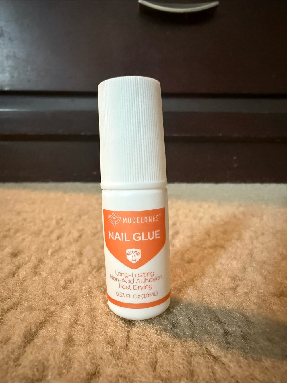 Modelones Nail Glue - White Bottle with Orange Label, Fast-Drying Adhesive